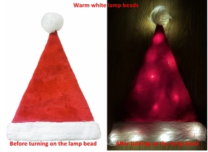 Macro detail of plush LED Christmas hat showing warm white lighting in dark environments