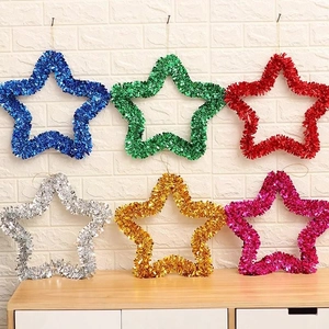 Set of six colorful 35cm tinsel star wreaths in blue green red silver gold and pink