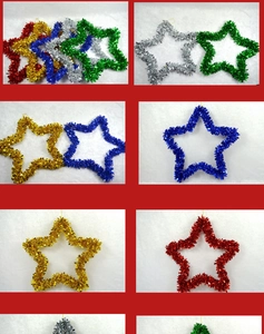 Detail of colorful tinsel star wreaths in red, gold, and green for Christmas decor