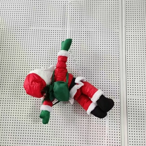 Figurine du Père Noël grimpant sur une corde blanche avec costume rouge classique