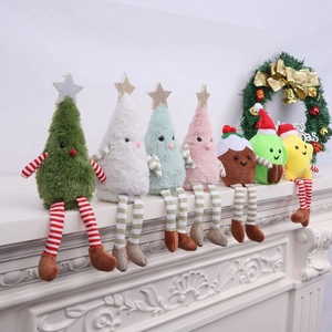 Detail of Christmas plush figurines with striped hanging legs on a festive fireplace mantel