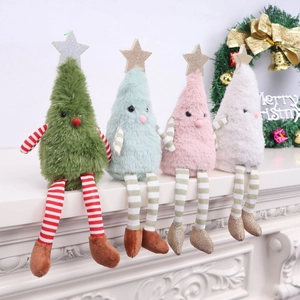 Set of four plush Christmas tree dolls in green, blue, pink and white holiday decor