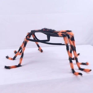 Detail of plush black and orange spider legs with furry texture for pet Halloween costume
