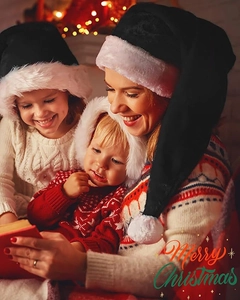 Family wearing black plush Santa hats with white faux fur trim for Christmas decoration