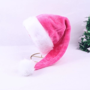 Detail of 75cm long plush Christmas hat in vibrant magenta pink and fluffy white