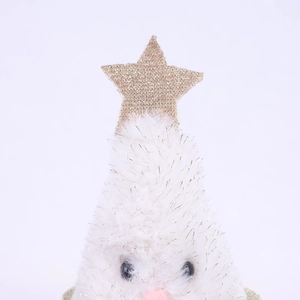 Detailed view of plush Christmas decoration with a golden glitter star and soft white faux fur