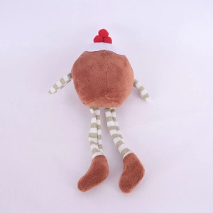 Close-up of cute Christmas pudding plush doll with striped limbs and soft brown velvet fabric