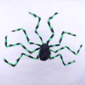 Halloween giant fuzzy spider decor with glowing eyes and green striped legs for parties
