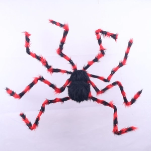 Large Halloween fuzzy spider decoration with red and black striped legs on white background