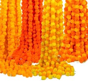Vibrant orange and yellow artificial marigold garlands for wedding and festival decor