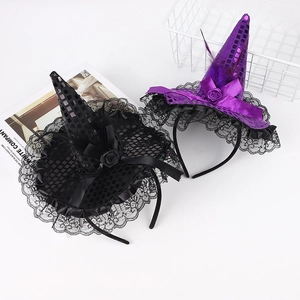 Detail of Halloween witch hat headband with sequins, lace trim, and feather accents