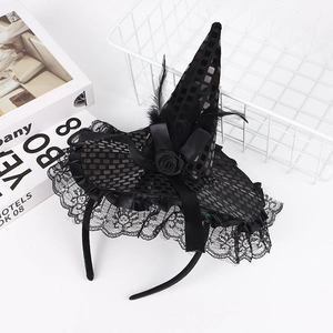 Detail of Halloween witch hat headband with black lace, sequins, and decorative roses
