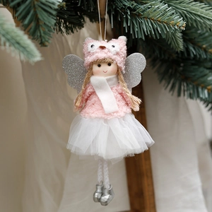 Poupée ange de Noël rose avec jupe en dentelle et ailes pailletées sur branche