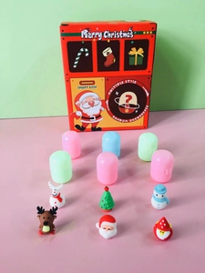 Detailed set of Christmas vending machine toy with colorful gashapon balls and resin figurines