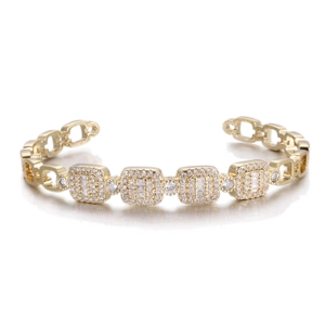 Golden open cuff bracelet with geometric square modules and sparkling zircon inlay
