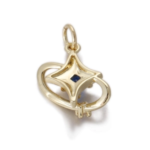 Detailed view of a gold star pendant with a square blue gemstone inlay for necklaces