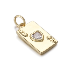 Detail of gold Ace of Hearts poker card pendant with heart-shaped cubic zirconia stone