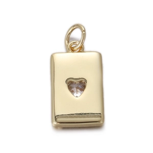 Close-up of golden rectangular Virgin Mary pendant with hollow heart and pink crystal
