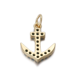 Detail of a gold anchor pendant featuring black pave-set stones and a round snap bail
