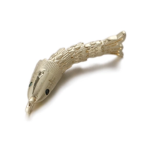 Detailed view of realistic 14k gold plated koi fish pendant with black stone eyes