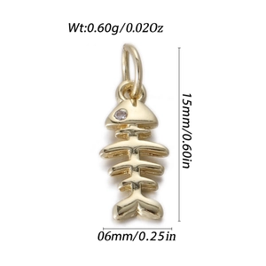 Detailed macro of a 14k gold plated fishbone pendant with zircon eye and dimensions