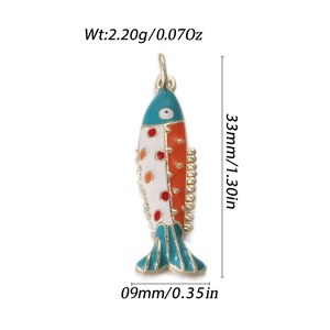 Detailed view of fish-shaped pendant with dimensions and blue enamel dots in gold