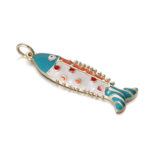 Close-up of a colorful koi fish pendant with 14k gold plating and enamel drop oil detail