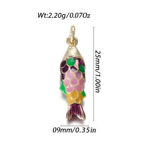 Detail view of 14k gold fish pendant with colorful enamel scales and sizing details