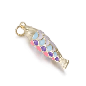 Macro detail of 14k gold-plated fish pendant with colorful enamel scales and metal ring