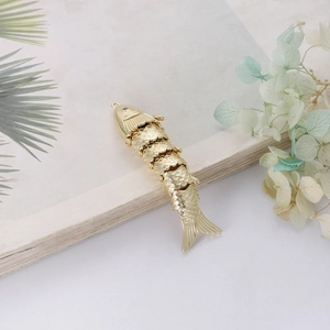 Articulated 14k gold-plated fish pendant with flexible multi-section koi design