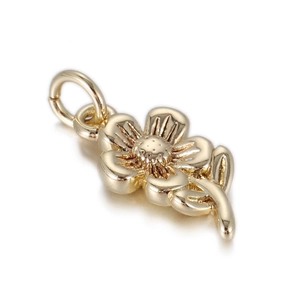 Macro shot of 14k gold plated five-petal flower pendant with textured stamen detail