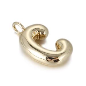 Close-up of golden 3D balloon-style letter C charm with textured wrinkle detail
