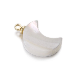 Detailed view of crescent moon pendant with natural white shell finish and gold loop