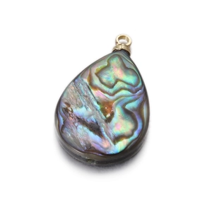 Macro shot of iridescent abalone shell teardrop pendant with a gold metal ring connector