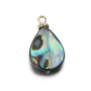 Macro shot of teardrop shell pendant with iridescent blue and purple pearl luster finish