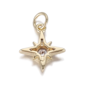 Detailed view of bohemian 14k gold plated star pendant with central sparkling cubic zirconia