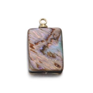 Detailed close-up of a rectangular white shell pendant with iridescent luster and gold ring