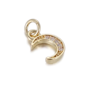 Macro detail of 14k gold plated crescent moon pendant with micro-pave zircons