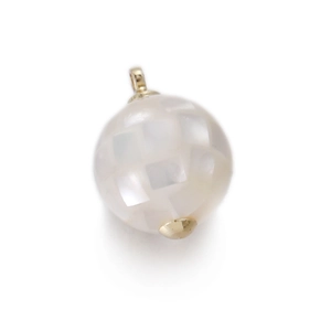 Detail view of round faceted white mother of pearl pendant with gold plating for jewelry DIY