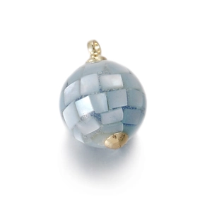 Detailed view of spherical pearl shell pendant with mosaic texture and gold hardware