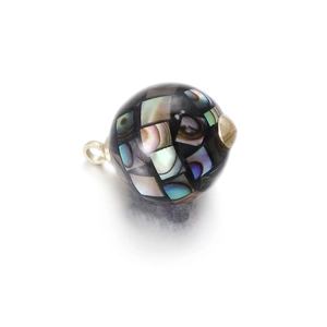 Macro detail of sphere pendant with rainbow shell inlay for DIY jewelry design