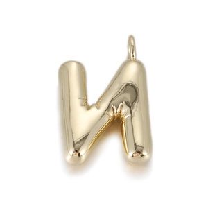 Detailed view of polished gold 3D balloon-style letter N pendant with top ring