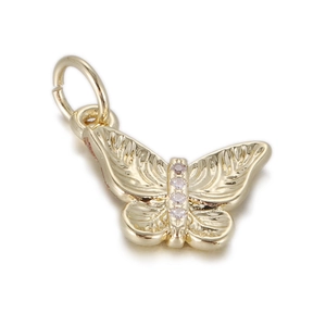 Detailed macro view of a gold butterfly charm with sparkling inset crystals and top loop