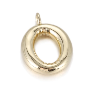 Macro shot of polished gold letter O pendant for customized necklaces and bracelets