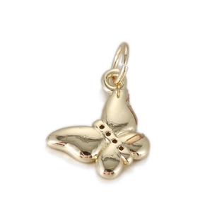 Detailed view of a 14k gold butterfly pendant with high polish and hollow dot details