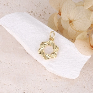 Elegant 14k gold plated bohemian twisted wreath pendant with sun and star accents