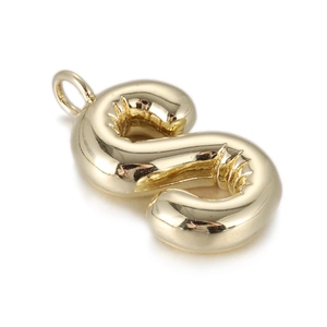 Macro view of gold-plated balloon letter S pendant with high-polished mirror finish