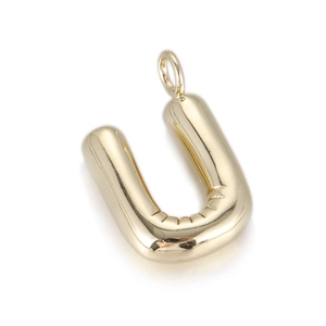Detail view of 3D balloon letter U pendant with polished gold finish and round bail