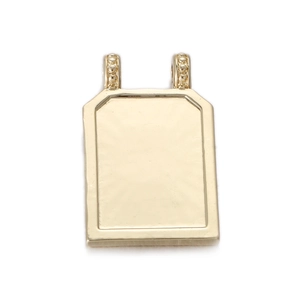 Detailed view of golden tarot style rectangular charm with decorative beaded texture double rings