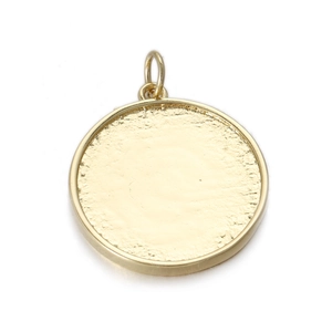 Detailed view of bohemian gold copper pendant with textured center for DIY jewelry making